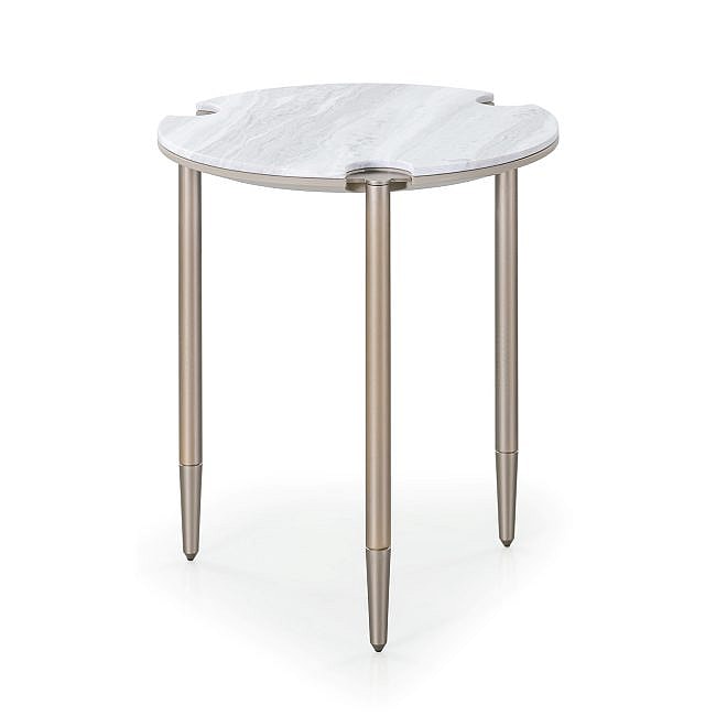 Tapering metal legs give Turri's ‘Zero’ table a light and elegant appearance